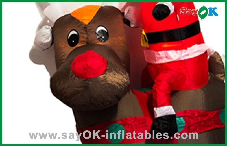 Cute Christmas Santa Father Inflatable Christmas Decoration Riding A Black Bear